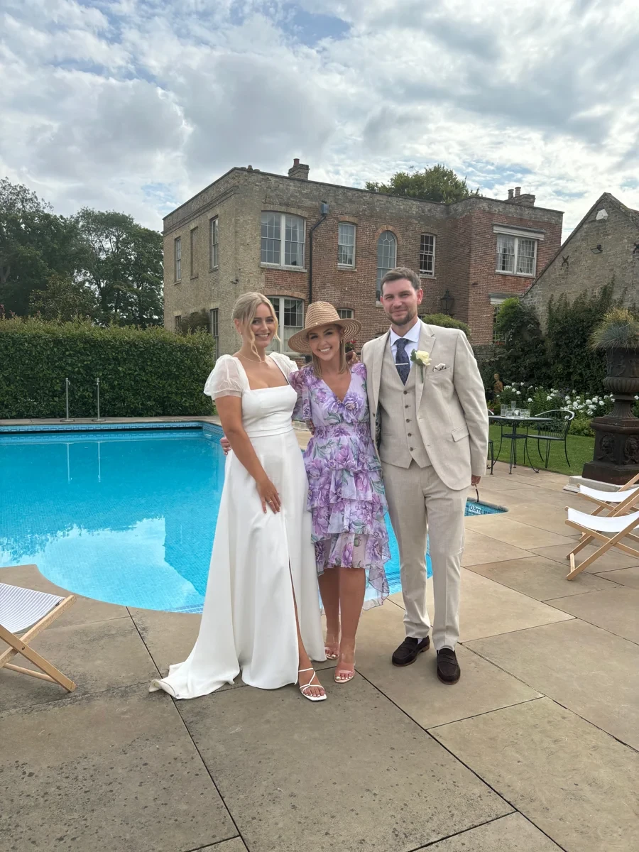Dale & Georgina with Cheryl on their wedding day